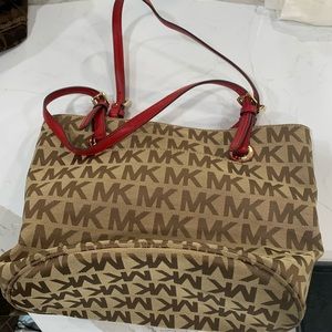 Tan and red Michael kors bag